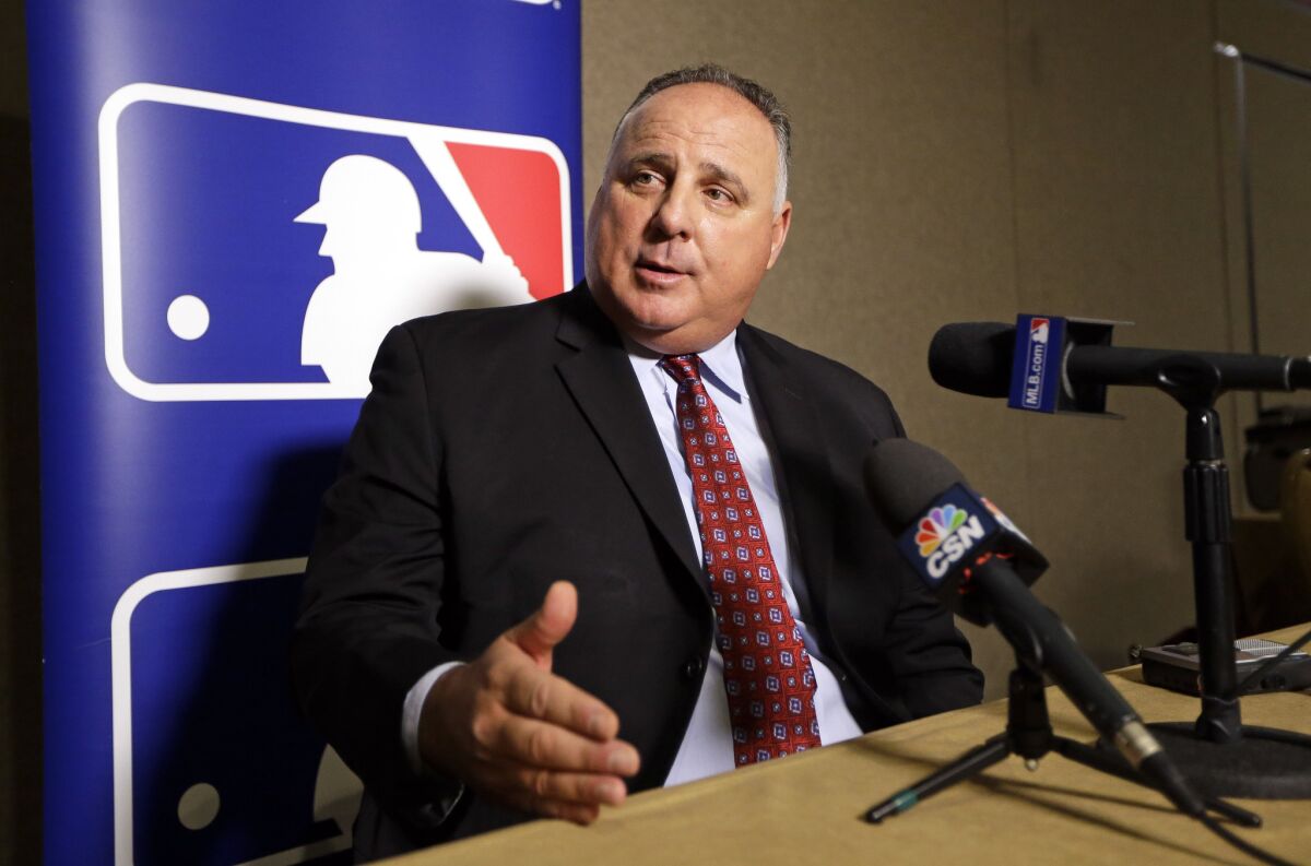 Angels Manager Mike Scioscia talks with reporters at Major League Baseball's winter meetings Wednesday in Nashville.