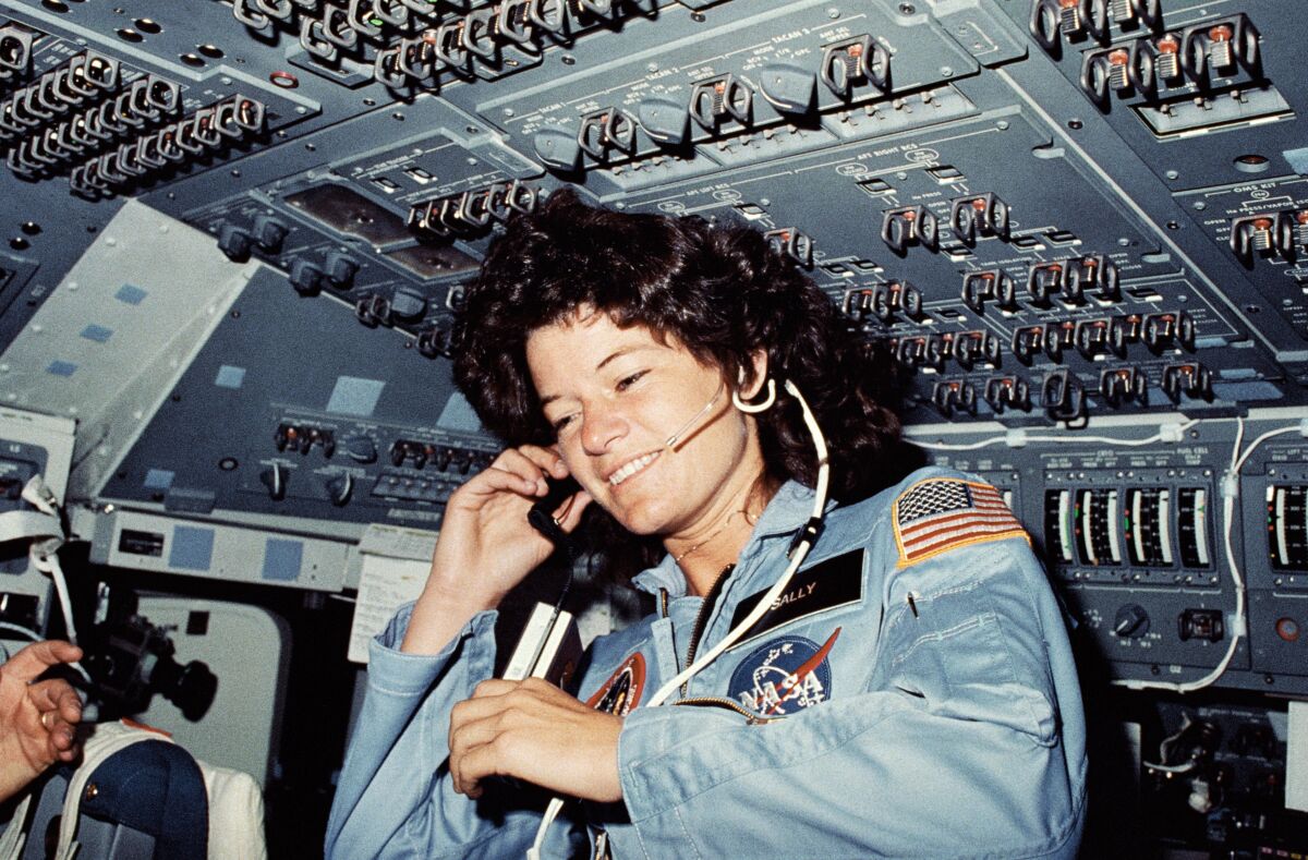 Sally Ride, America's first woman in space, on the flight deck of the space shuttle Challenger in 1983.