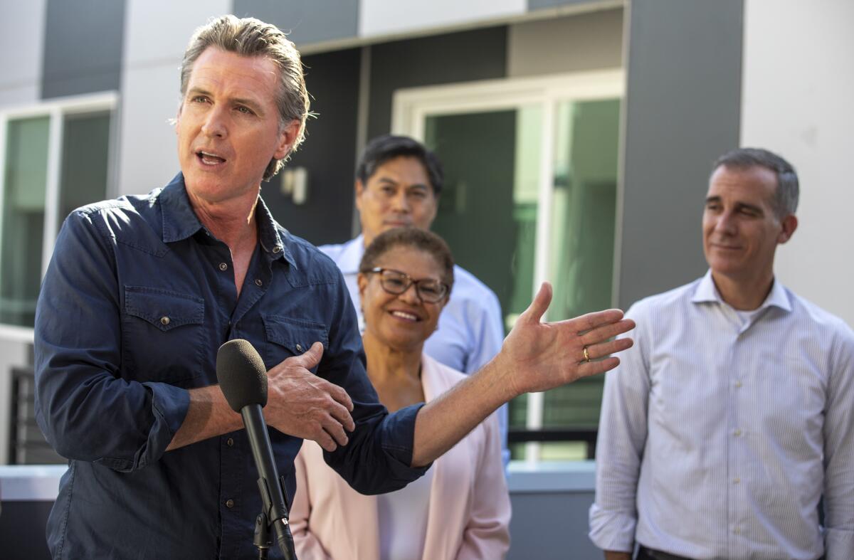 Gov. Gavin Newsom announces the latest round of awards for homeless housing projects across the state on Aug. 24.