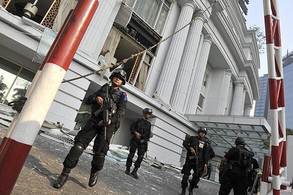 Police at Jakarta hotel bombing site