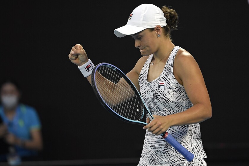 Ash Barty of Australia celebrates after defeating Jessica Pegula of the U.S. in their quarterfinal match at the Australian Open tennis championships in Melbourne, Australia, Tuesday, Jan. 25, 2022. (AP Photo/Andy Brownbill)