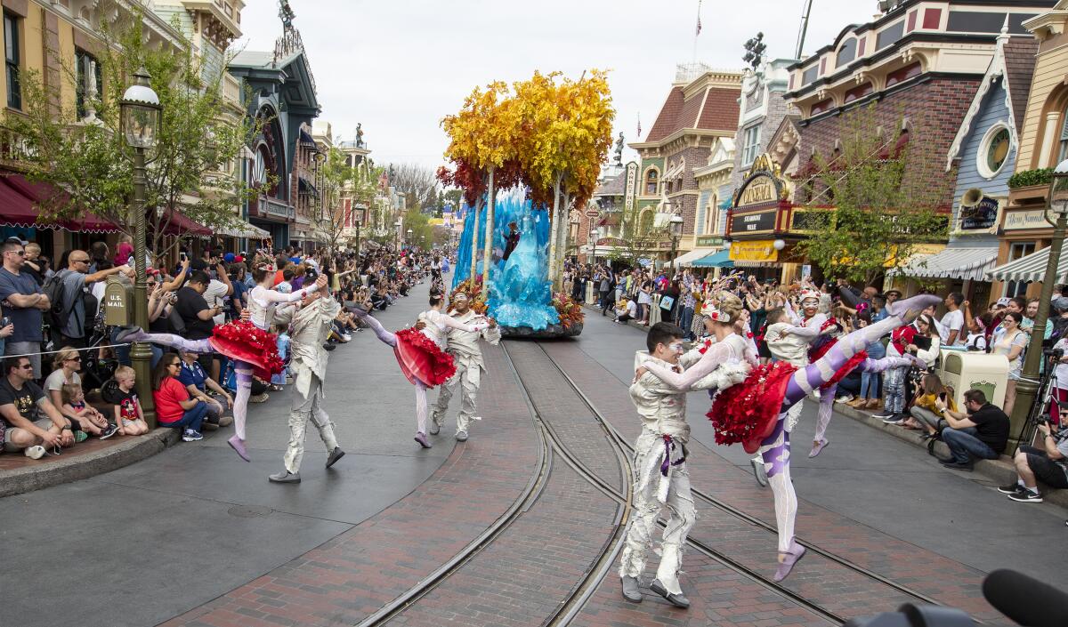 Dancers in front of a "Frozen 2" float bring a bit of ballet to Disneyland.