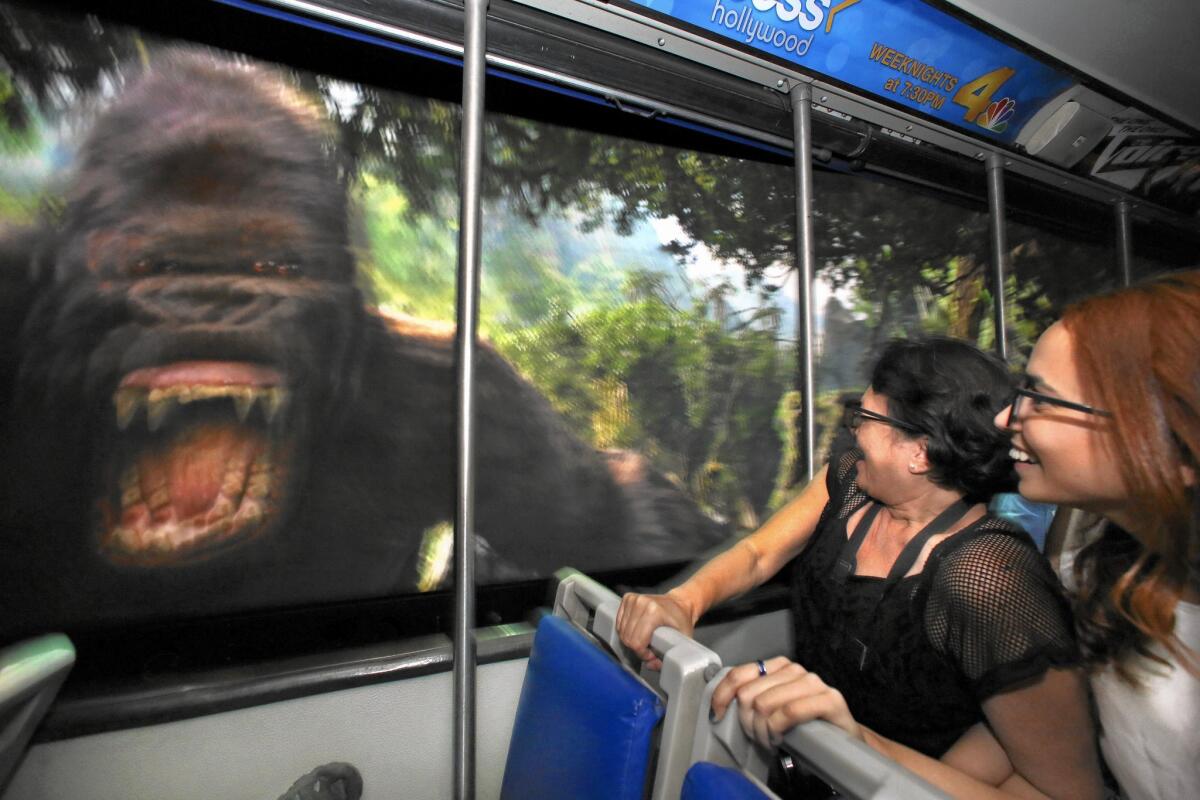 Universal Studios Hollywood visitors on a tram last week experience the King Kong attraction. The theme park draws 6 million visits a year.