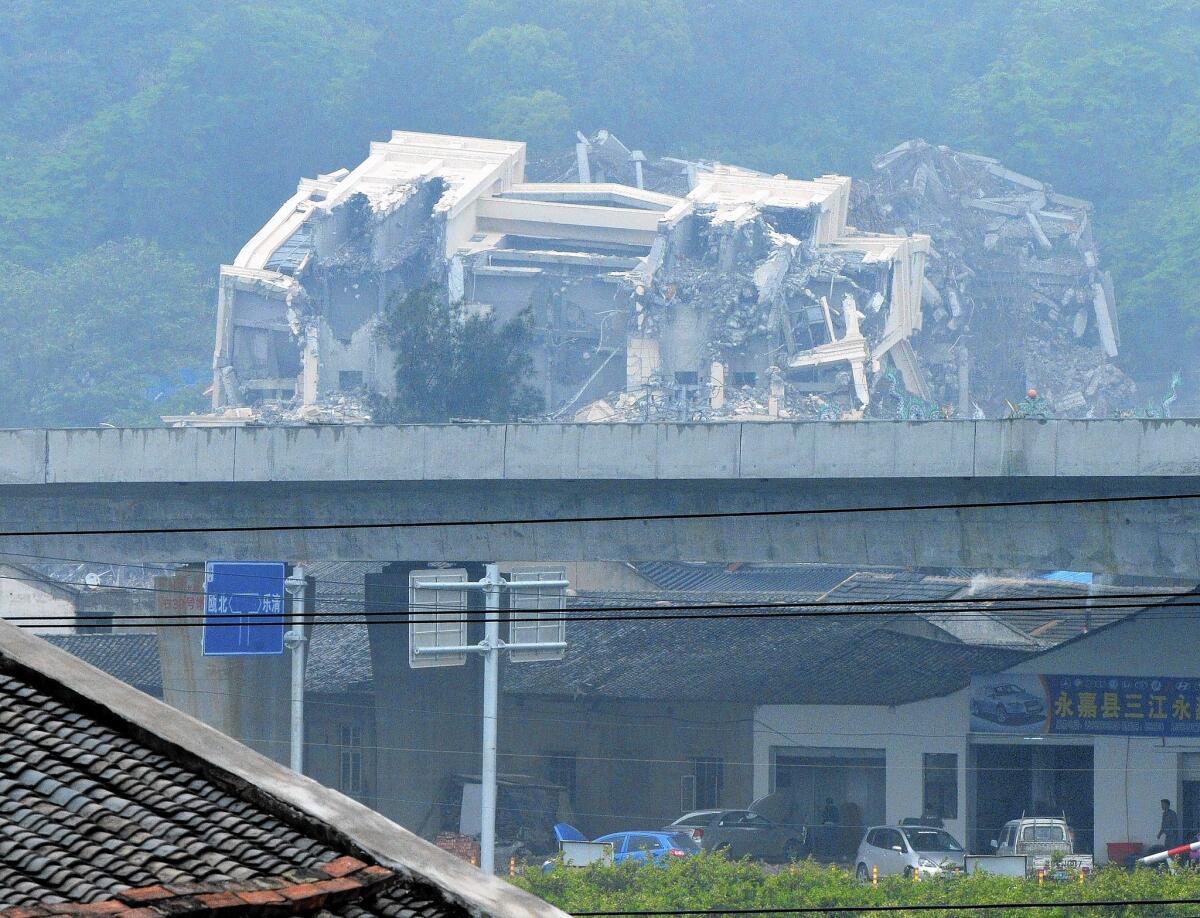 Three Rivers Church in Wenzhou, China, was demolished last month. Five bureaucrats have been charged with failing to stop construction of a church they knew was to be much larger than permits allowed.