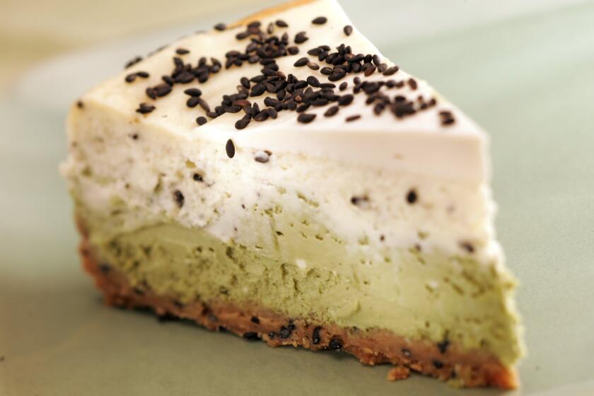 Layered green tea and black sesame cheesecake.