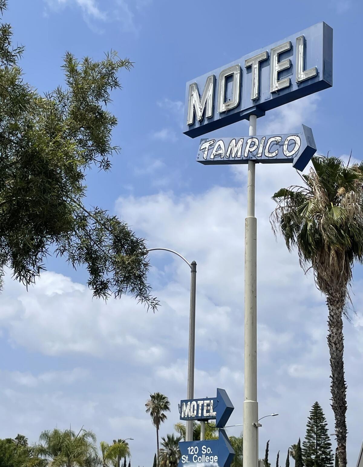 A sign for Tampico Motel