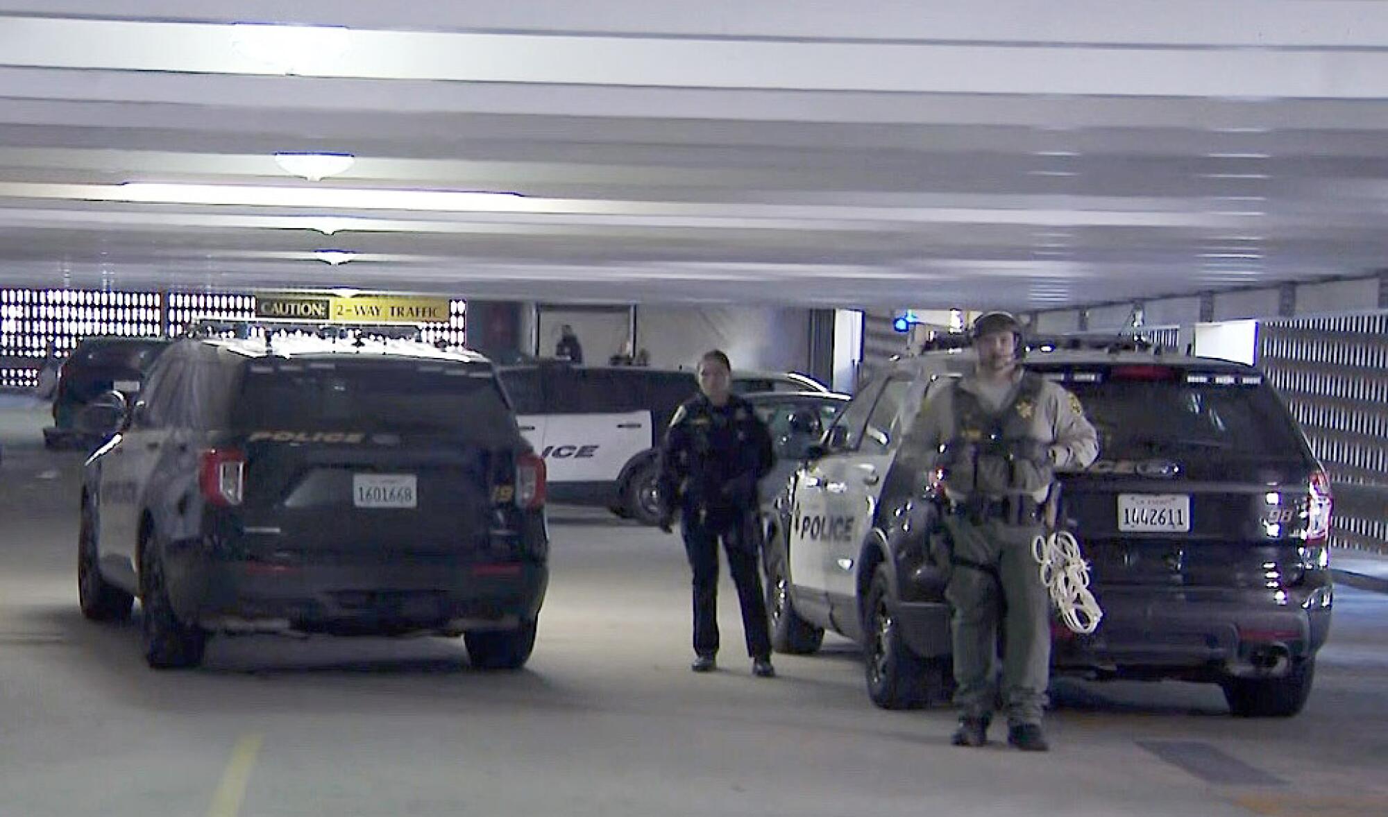 Police secure a parking structure at UCLA.