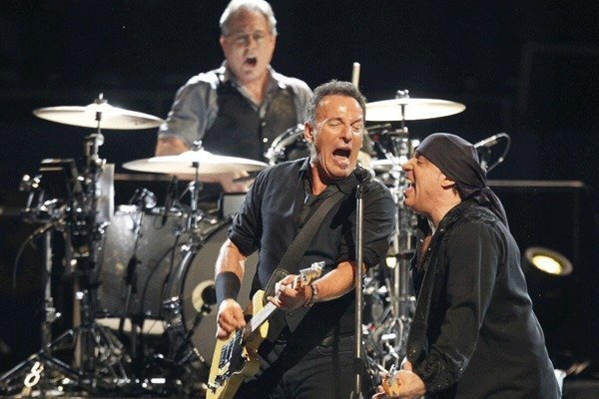 Bruce Springsteen, center, with Steven Van Zandt and drummer Max Weinberg.