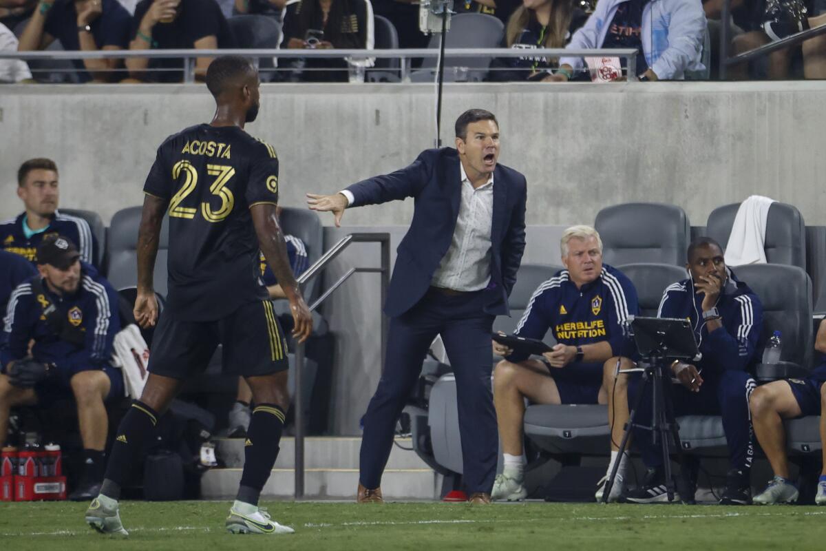 Galaxy coach Greg Vanney directs his players during a playoff loss to LAFC in October.