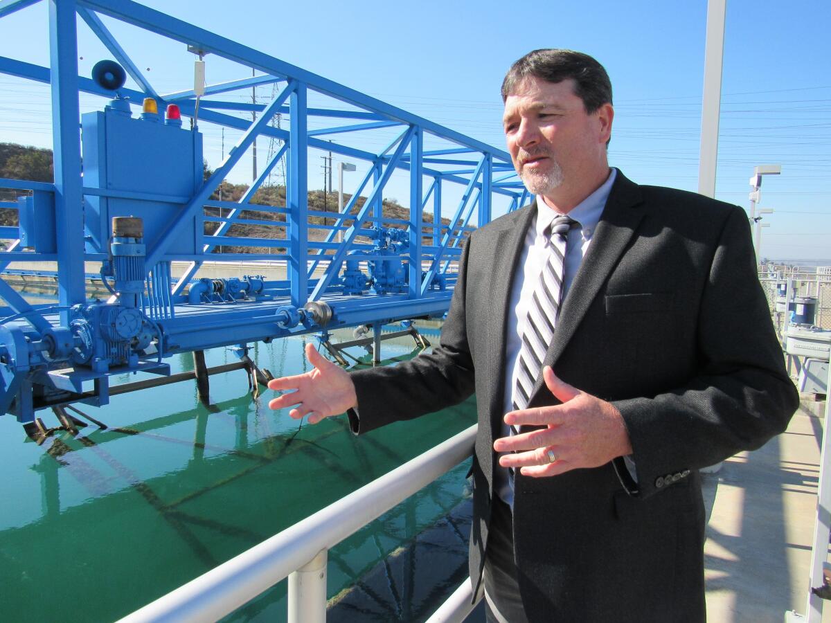 Helix Water District assistant GM Brian Olney discusses water quality at R.M. Levy Water Treatment Plant in Lakeside.