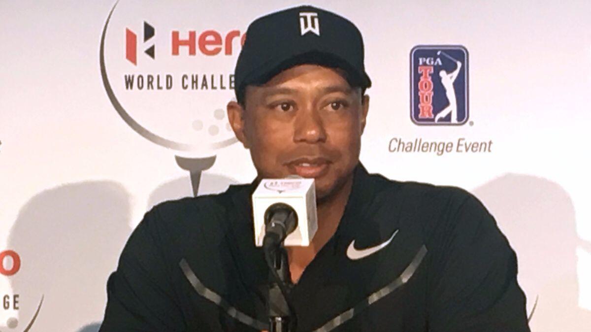 Tiger Woods speaks at a press conference at the Albany Golf Club in Nassau, Bahamas on Tuesday. Woods is playing in this week's Hero World Challenge, his first tournament since fusion surgery on his lower back in April.