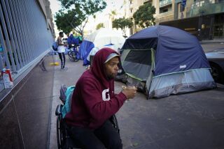San Diego, CA - January 31: On the corner of 7th Avenue and E Street in downtown San Diego on Tuesday, Jan. 31, 2023, David eats cereal from a cup not far from his tent on the corner. David say he has been living in the area for while now. (Nelvin C. Cepeda / The San Diego Union-Tribune)