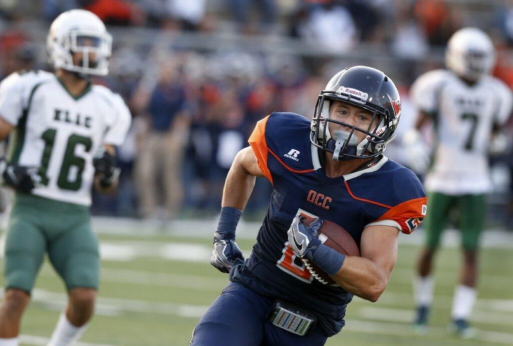 Orange Coast College wide receiver Joey Cox sprints toward the end zone for a touchdown.