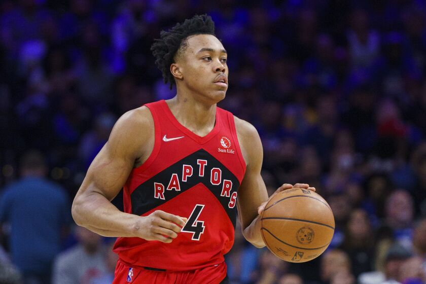 The Toronto Raptors' Scottie Barnes handles the ball during Game 1 of a first-round playoff series April 16, 2022.