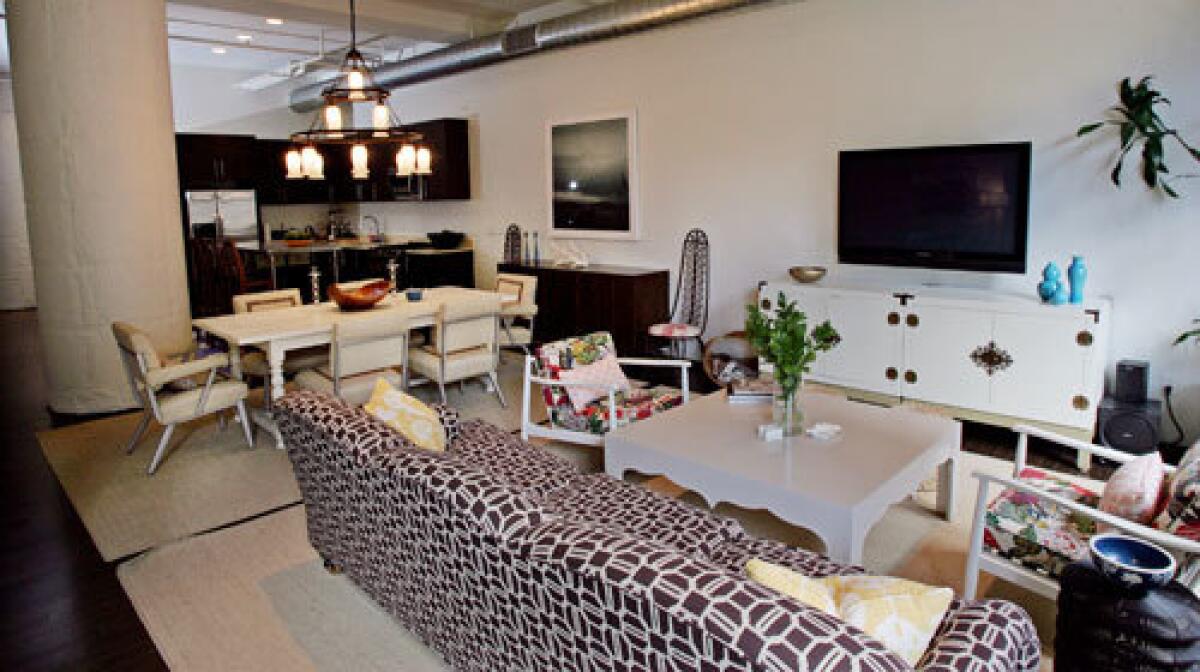 The living-dining-kitchen space in interior designer Jennifer Culp's home at the Broadway Hollywood lofts.