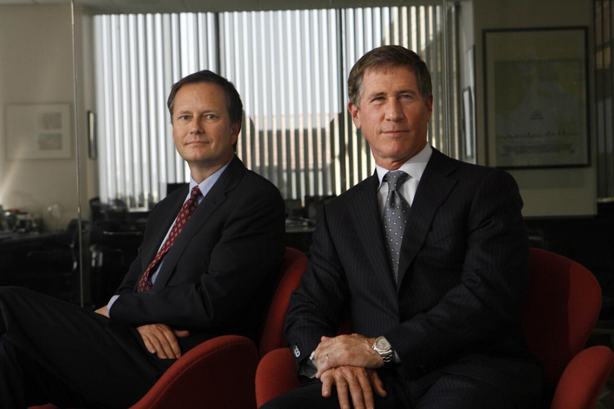Lionsgate vice chairman Michael Burns, left, and CEO Jon Feltheimer at the company's Santa Monica offices on April 3, 2010.