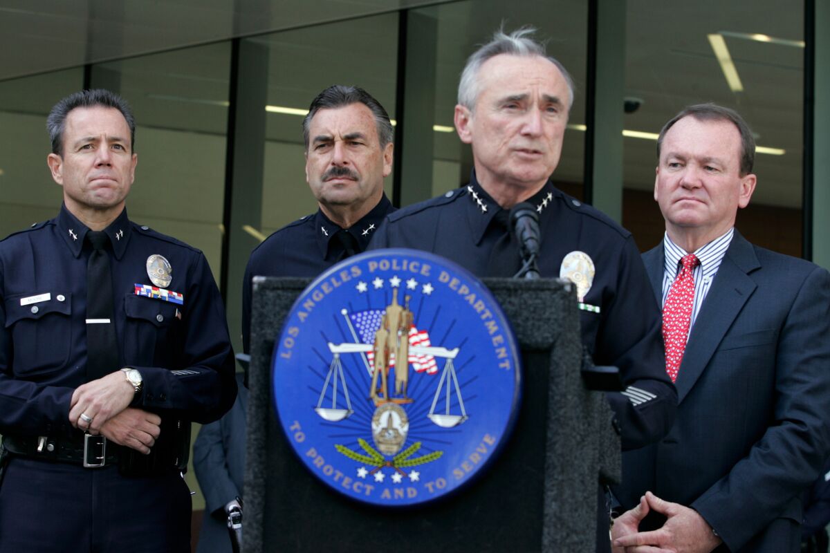Former Los Angeles Police Chief William Bratton at his final new conference in downtown Los Angeles in 2009. Then Deputy Chief Charlie Beck, second from left, succeeded Bratton.