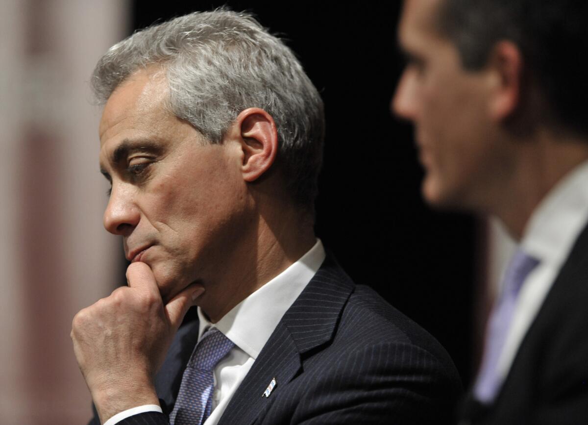 Chicago Mayor Rahm Emanuel, left, and L.A. Mayor Eric Garcetti, shown together in April, have made a wager on their cities' hockey teams.