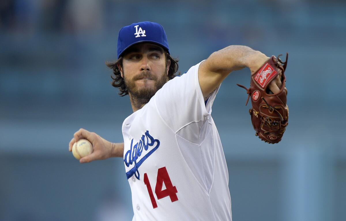 Dodgers starting pitcher Dan Haren gave up eight hits, including the 20th home run of the season, in 4 1/3 innings against the Cubs on Friday night.