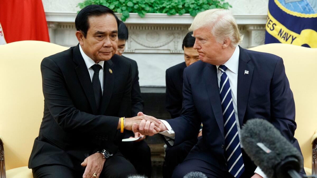 President Trump shakes hands with Thai Prime Minister Prayuth Chan-ocha during a meeting Oct. 2 in the Oval Office.