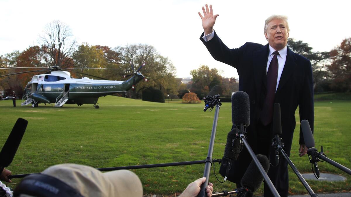 President Trump speaks to the media before leaving the White House on Nov. 21 to travel to Florida, where he will spend Thanksgiving at his Mar-a-Lago resort.