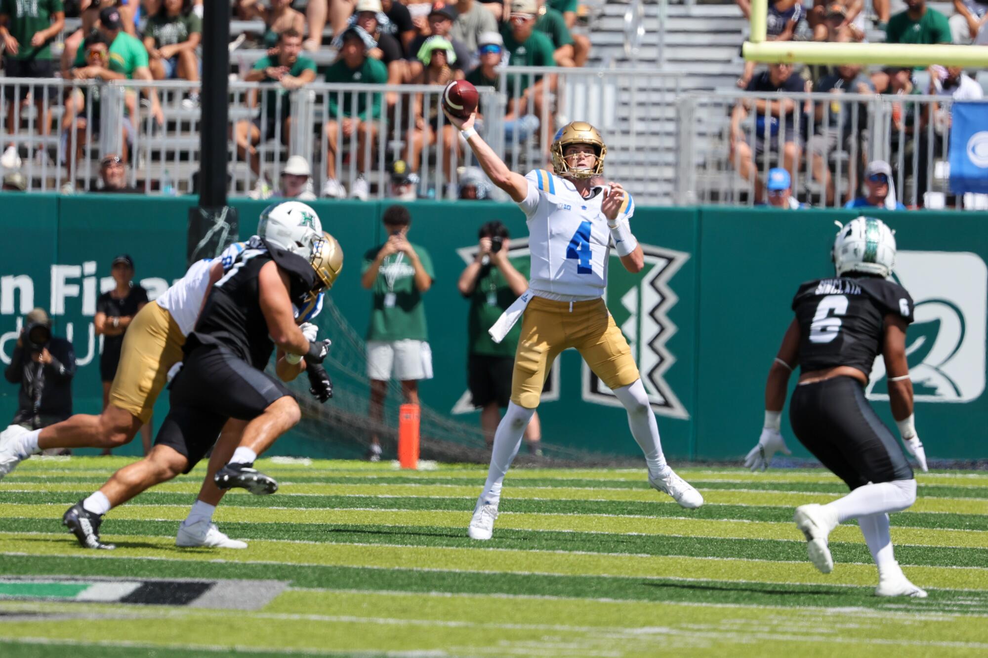 UCLA quarterback Ethan Garbers passes during the first quarter against Hawaii on Saturday.