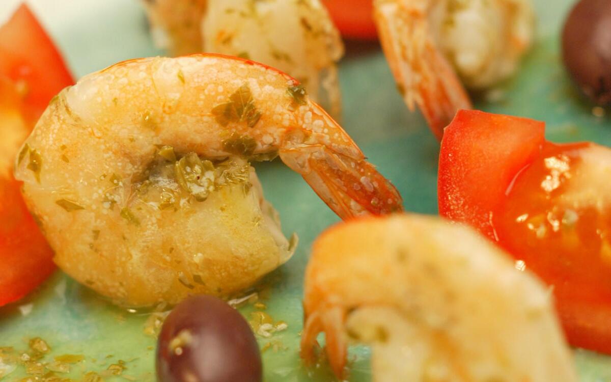 Marinated shrimp Cretan style in salty lemon dip