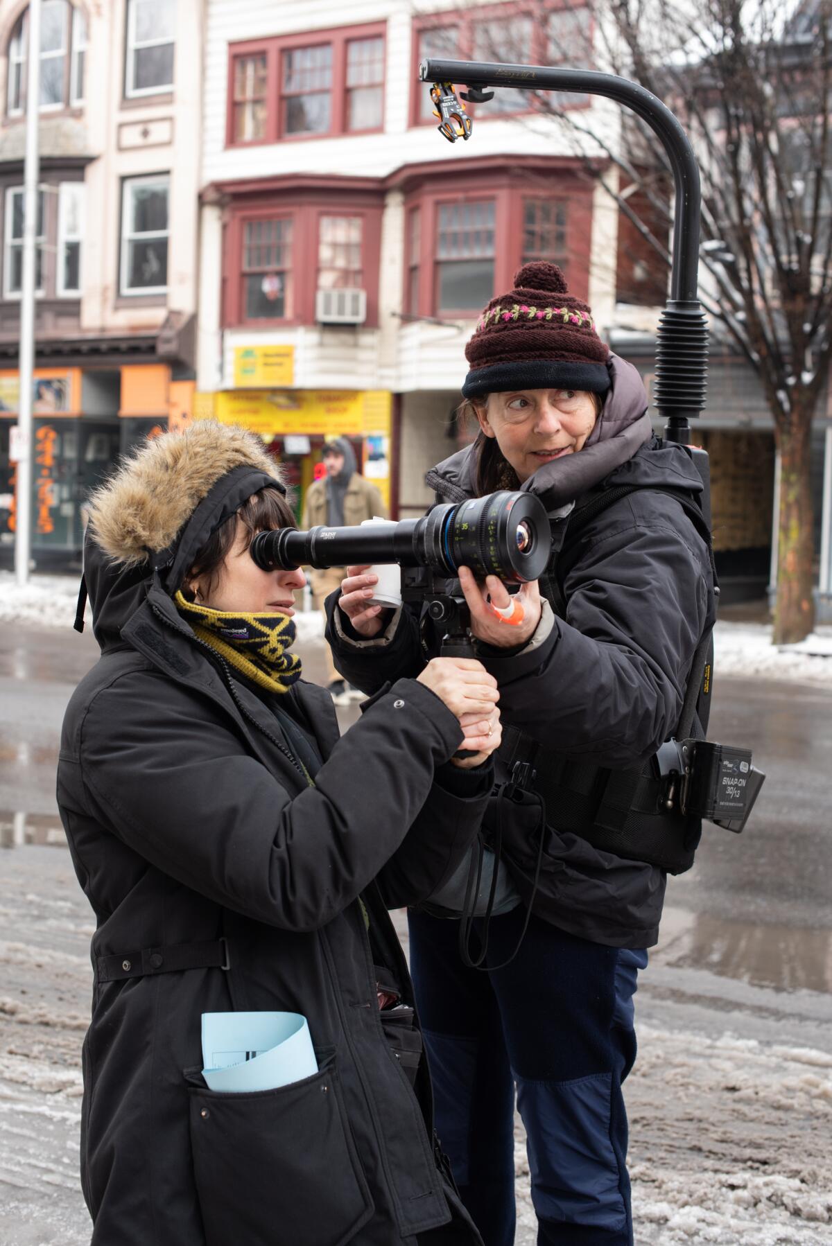 Director Eliza Hittman and cinematographer Hélène Louvart behind the camera on the set of "Never Rarely Sometimes Always."
