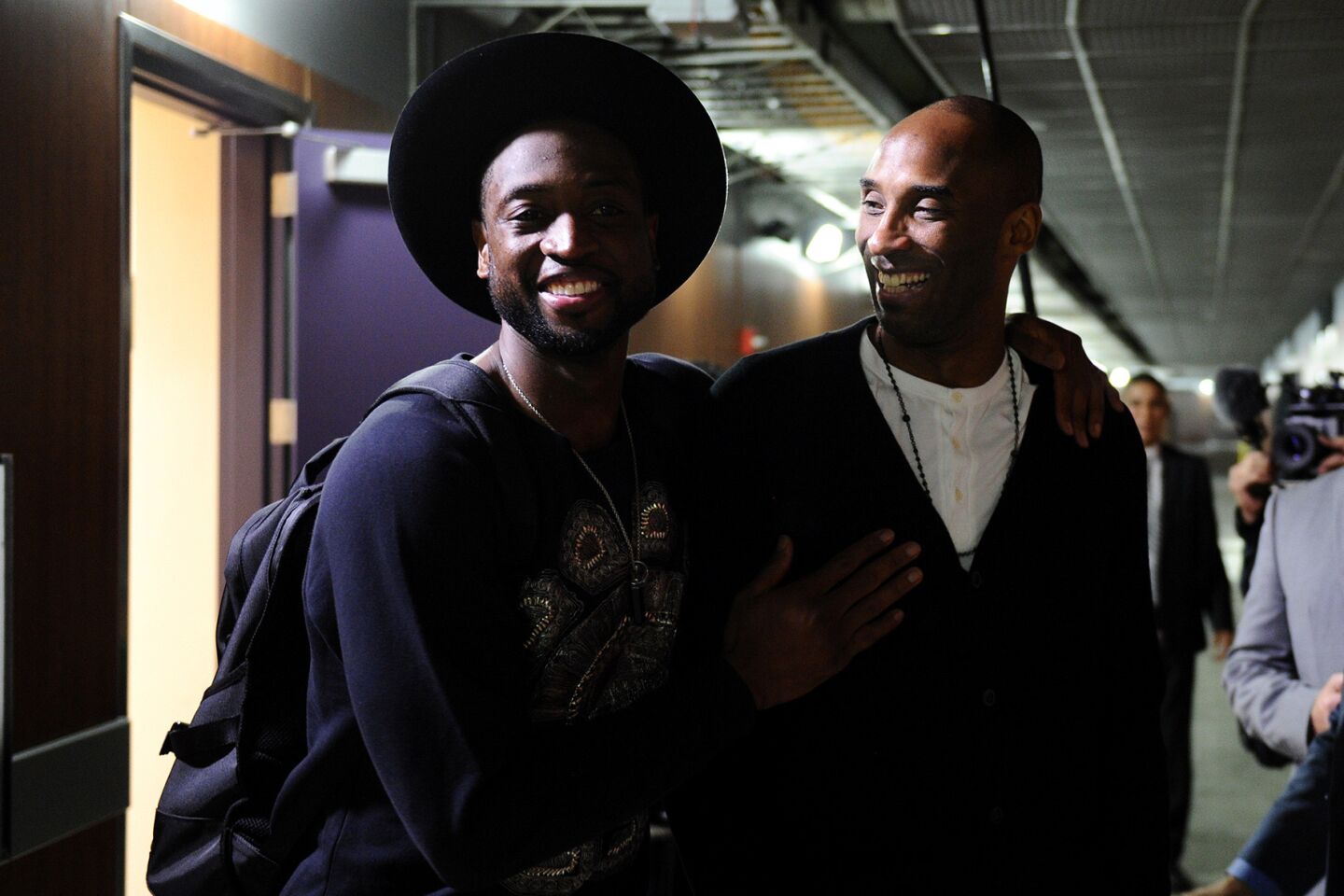 The Miami Heat's Dwyane Wade, left, and Kobe Bryant share a laugh after a game at Staples Center on March 30.