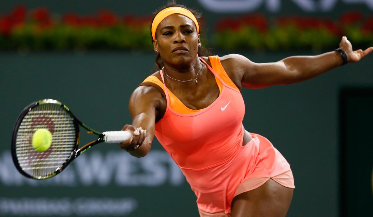 Serena Williams returns a shot during her victory over Timea Bacsinszky in the Paribas Open on Wednesday.