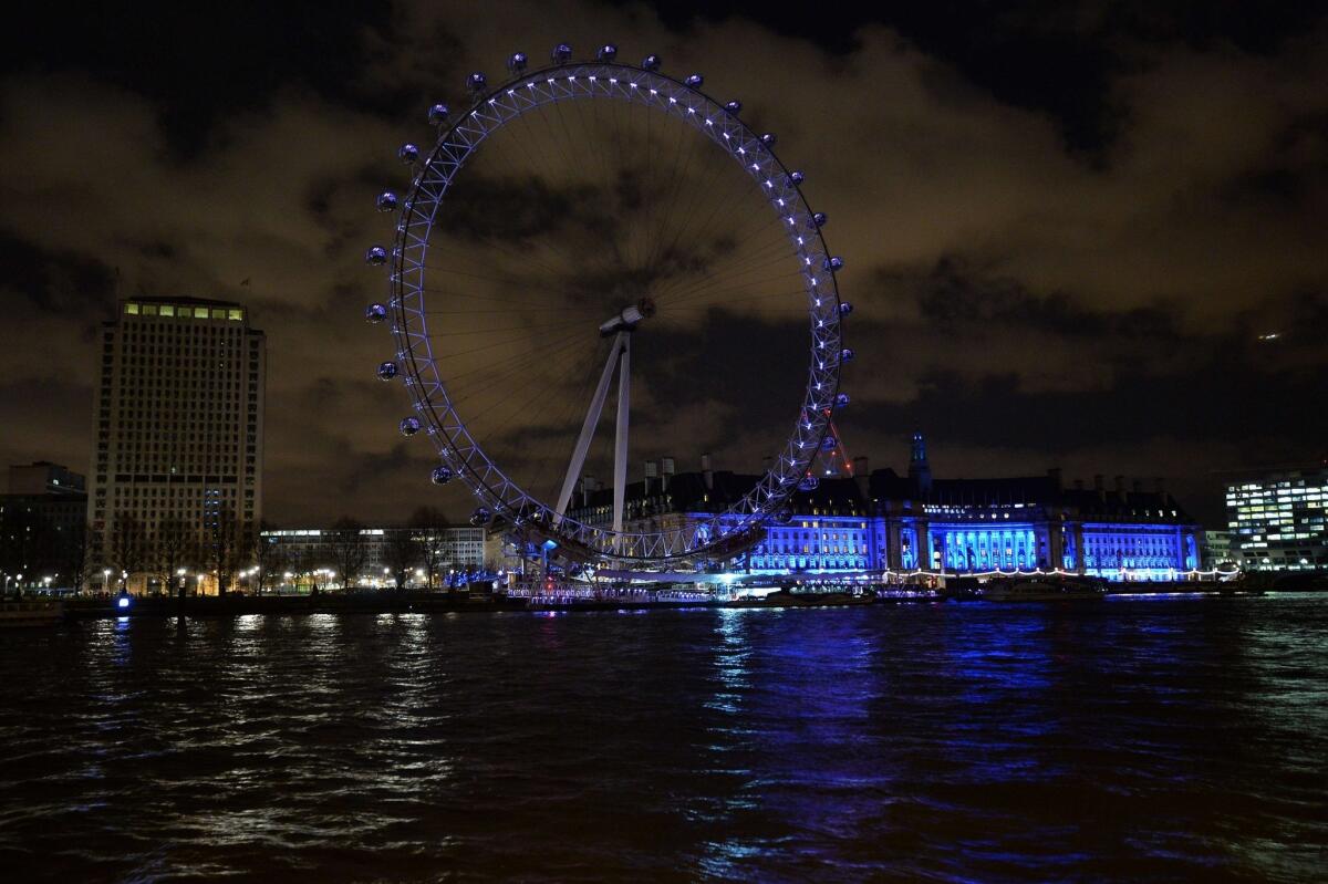 The London Eye illuminated at night on March 28.