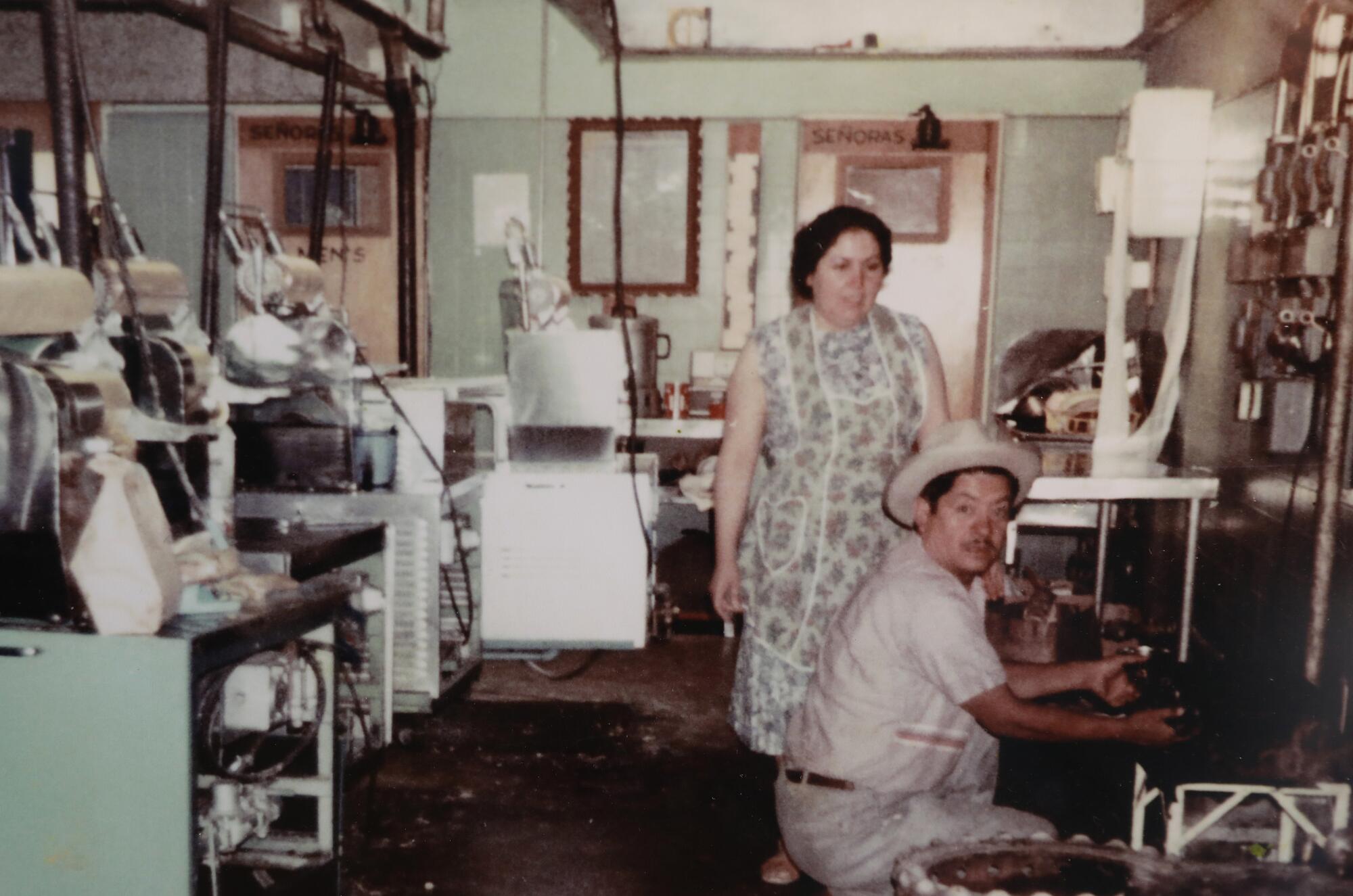 A family photo of founders Manuel and Antonia Behar in their factory