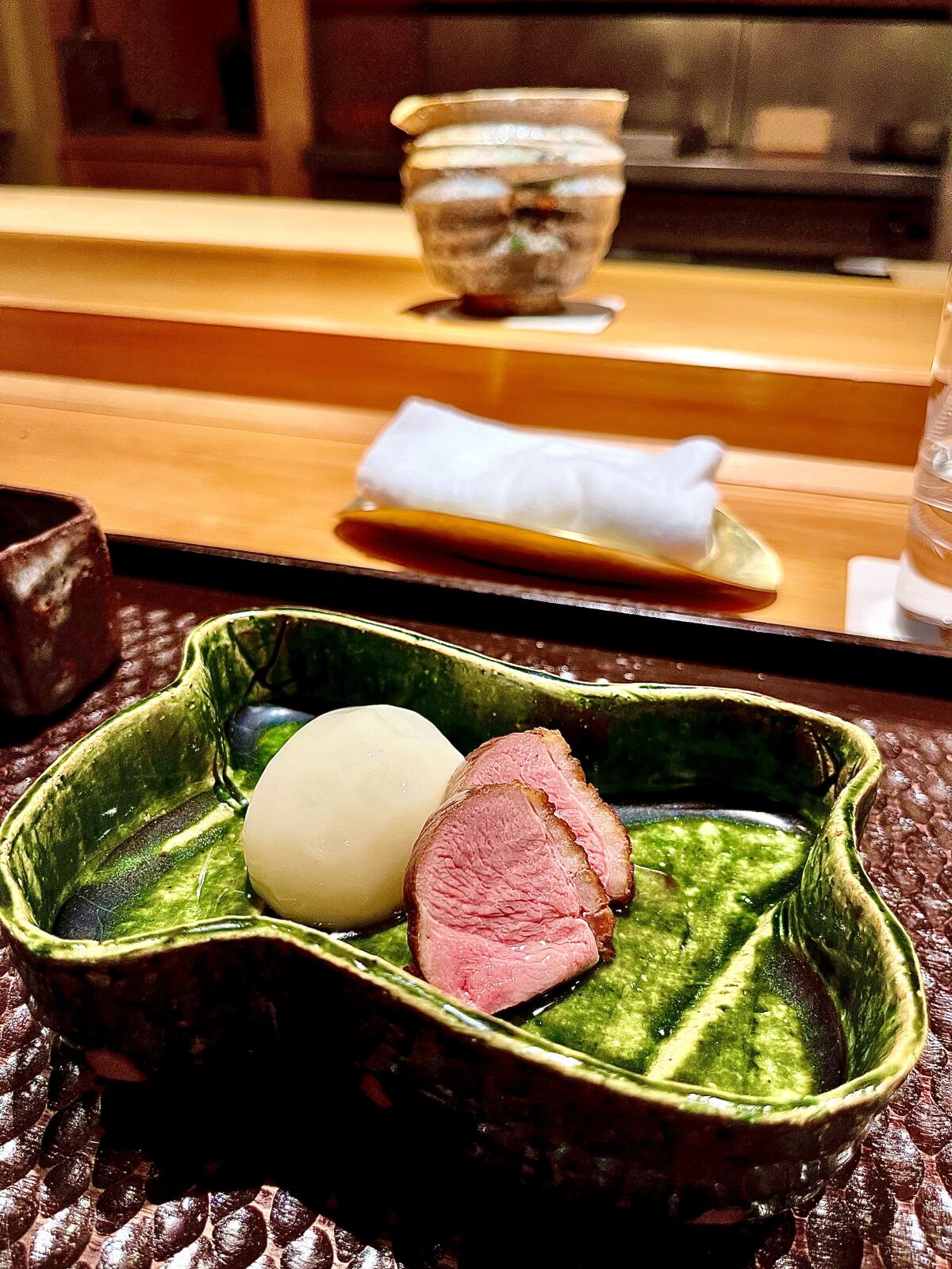 Steamed and grilled duck with turnip at Hayato in downtown Los Angeles.