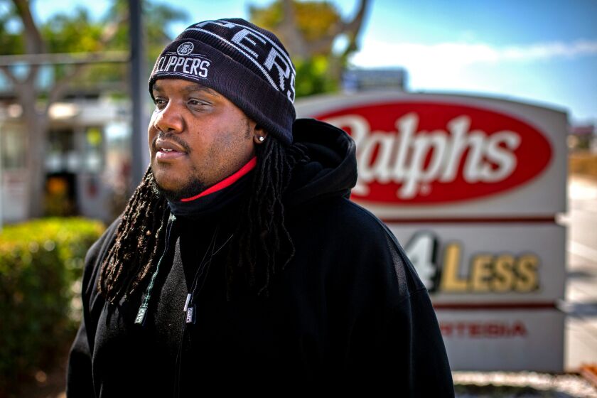 Henry Ephraim poses for a portrait outside the Ralphs/Food 4 Less distribution center in Compton