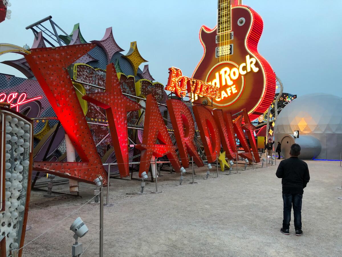 A man looks at the Neon Museum in Las Vegas.