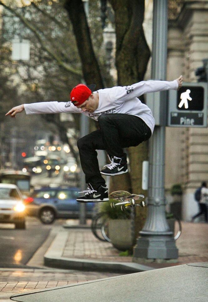Skateboarder, downtown Portland