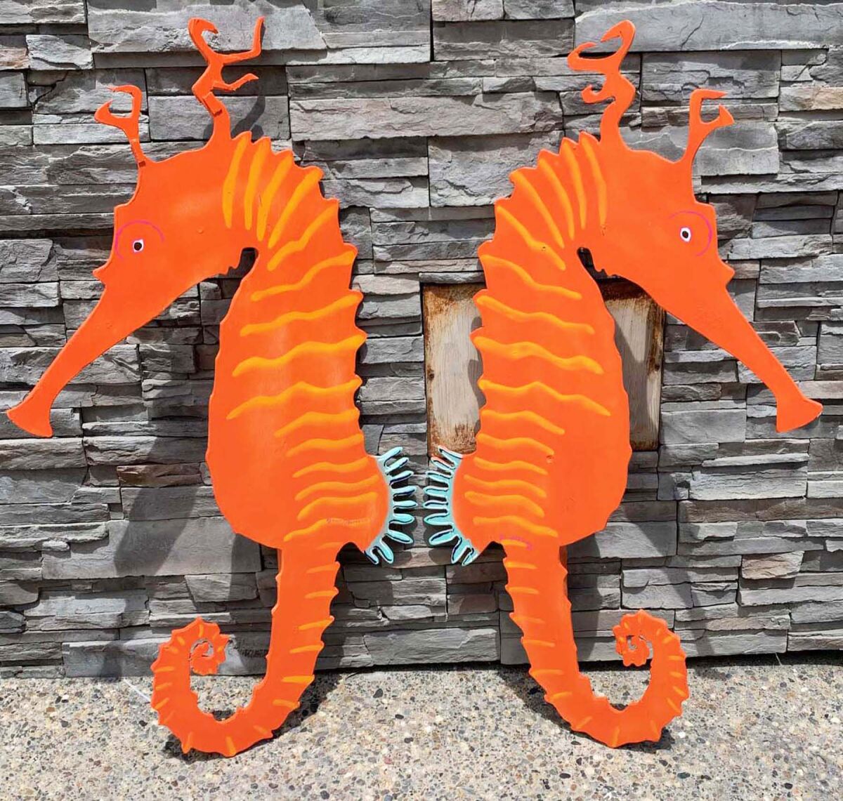Plywoodensis art of seahorses.