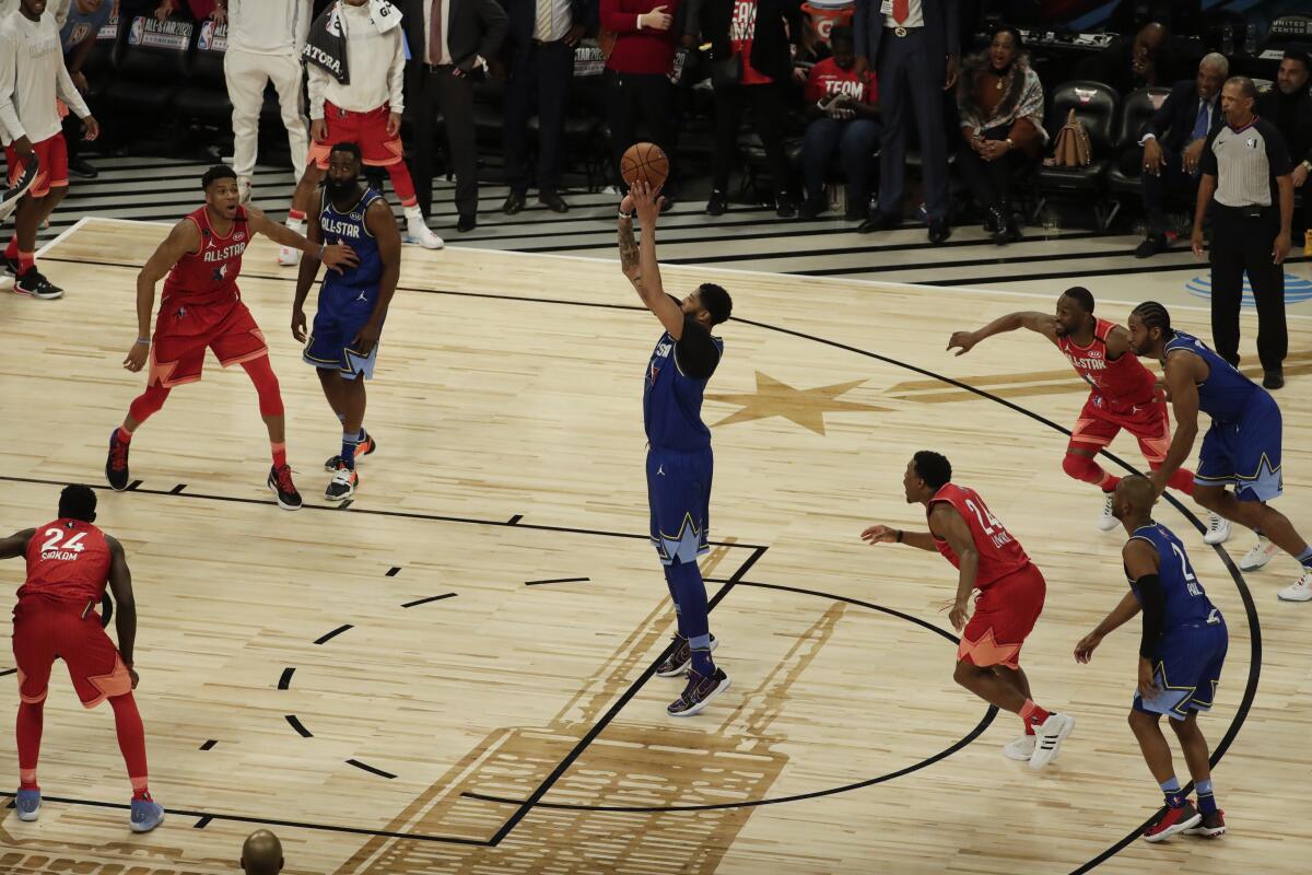 Lakers' Anthony Davis shoots the game-winning free throw during the second half of the NBA All-Star game on Sunday in Chicago.