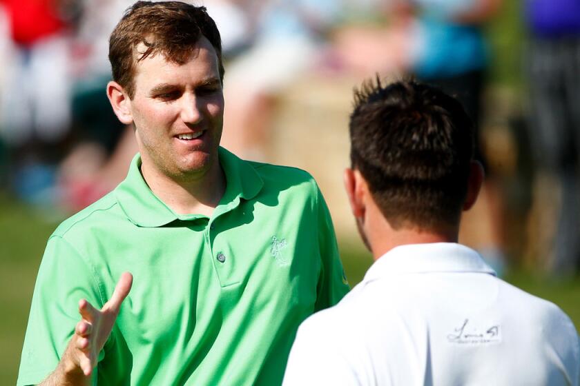 Brendon Todd is congratulated by Louis Oosthuizen after winning the Byron Nelson Championship on Sunday.