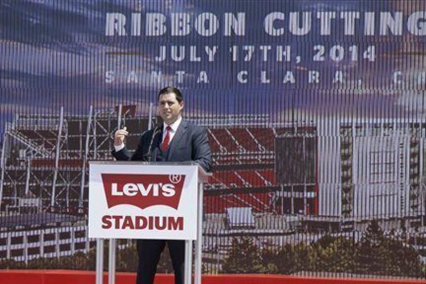 San Francisco 49ers CEO Jed York speaks before the ribbon-cutting and opening of Levi's Stadium Thursday, July 17, 2014, in Santa Clara, Calif. The San Francisco 49ers held a ribbon-cutting ceremony to officially open their new home. The $1.2 billion Levi's Stadium, which took only about 27 months to build, also will host the Super Bowl in 2016 and other major events. (AP Photo/Eric Risberg)