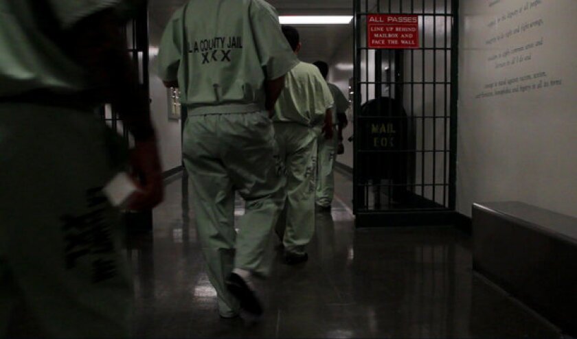Officials have reported high rates of coronavirus infections in Los Angeles County jails.