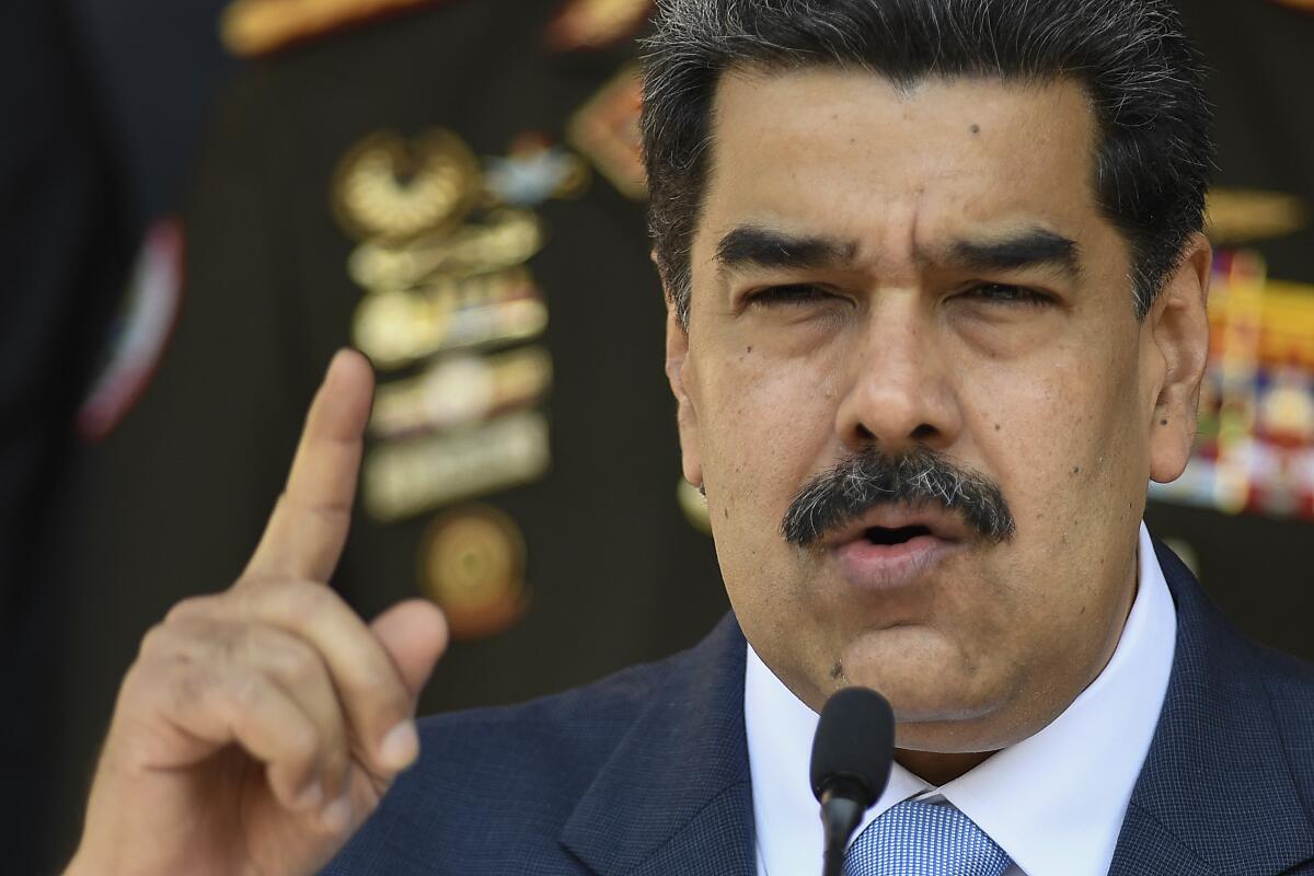 Venezuelan President Nicolas Maduro holds a news conference at Miraflores presidential palace in Caracas.  