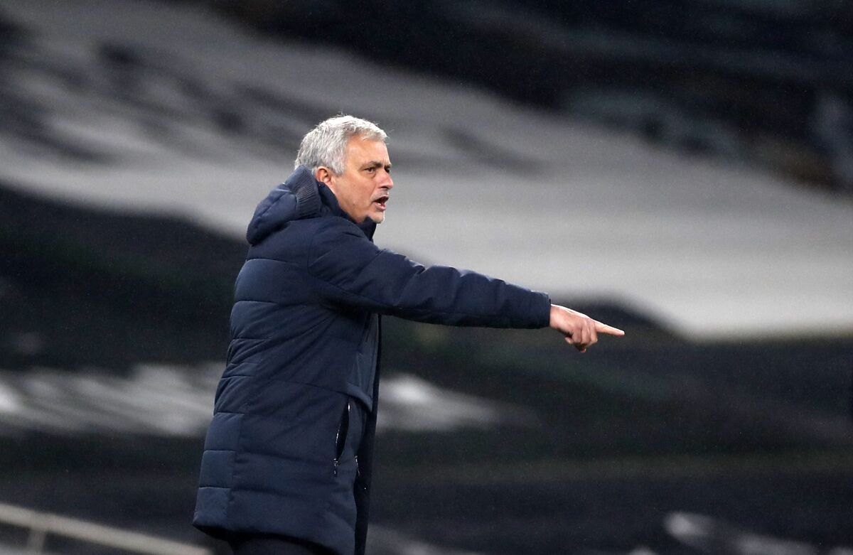 Tottenham's manager Jose Mourinho gives instructions to his players during the English Premier League soccer match between Tottenham Hotspur and Fulham at the Tottenham Hotspur Stadium in London, Wednesday, Jan. 13, 2021. (Matthew Childs/Pool via AP)