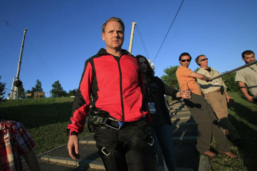 High-wire artist Nik Wallenda prepares for a practice session on the day before his historic walk across Niagara Falls.