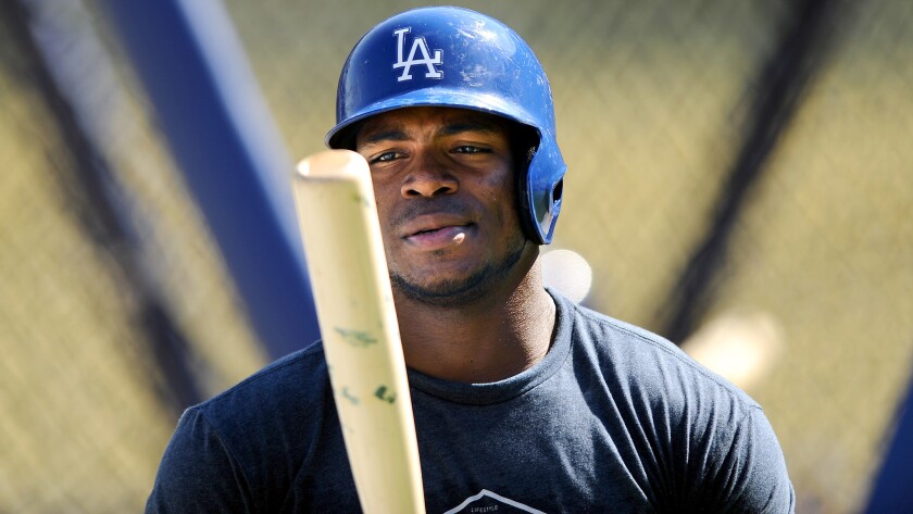 Dodgers outfielder Yasiel Puig prepares for batting practice on Oct. 7 before the start of the National League division series against the New York Mets.