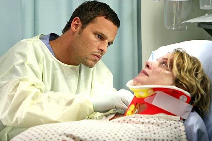 Things get tense between Alex (Justin Chambers) and Izzie (Katherine Heigl) when he realizes she's falling for Denny (Jeffrey Dean Morgan). Despite his jealousy, though, Alex rushes to console her when the heart patient dies.
