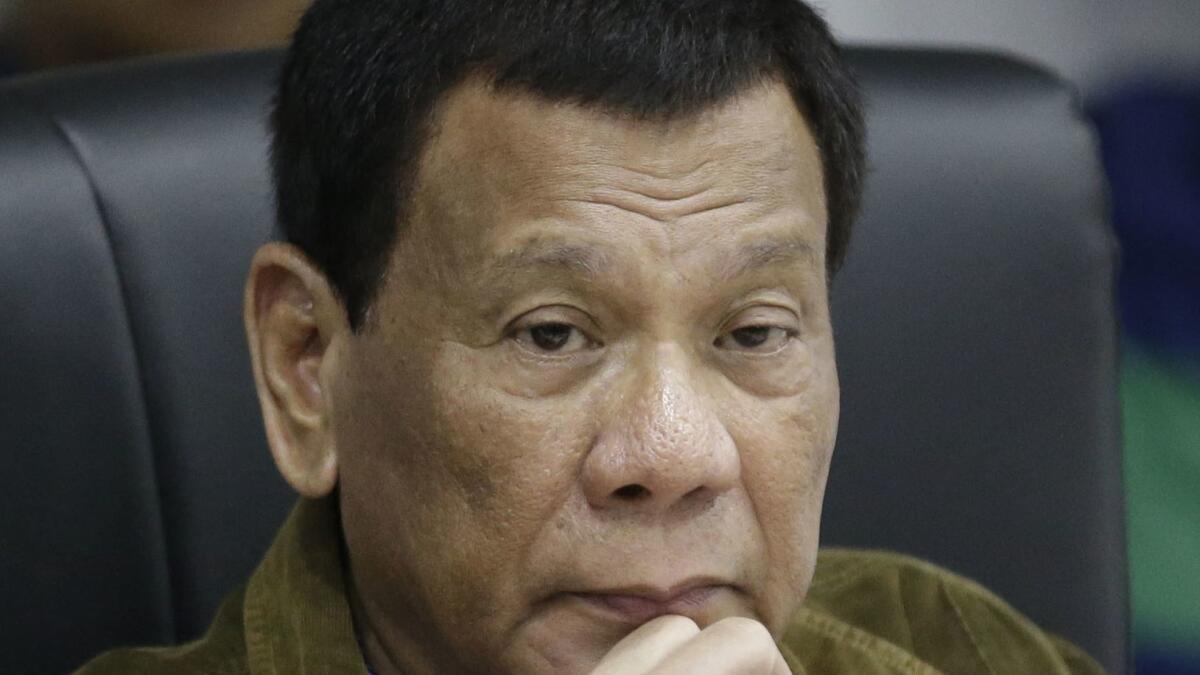 Philippine President Rodrigo Duterte listens during a command conference on Typhoon Mangkhut at the National Disaster Risk Reduction and Management Council operations center in metropolitan Manila on Sept. 13.