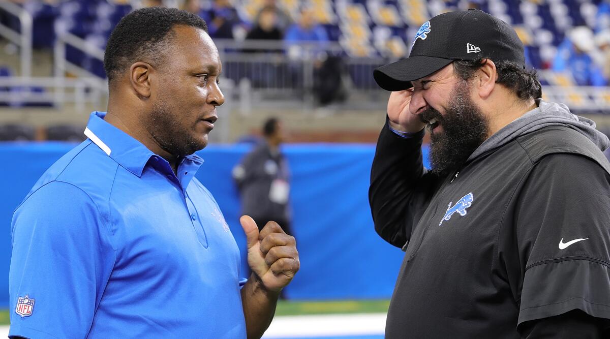 Barry Sanders, left, and Detroit Lions coach Matt Patricia at Ford Field in November.