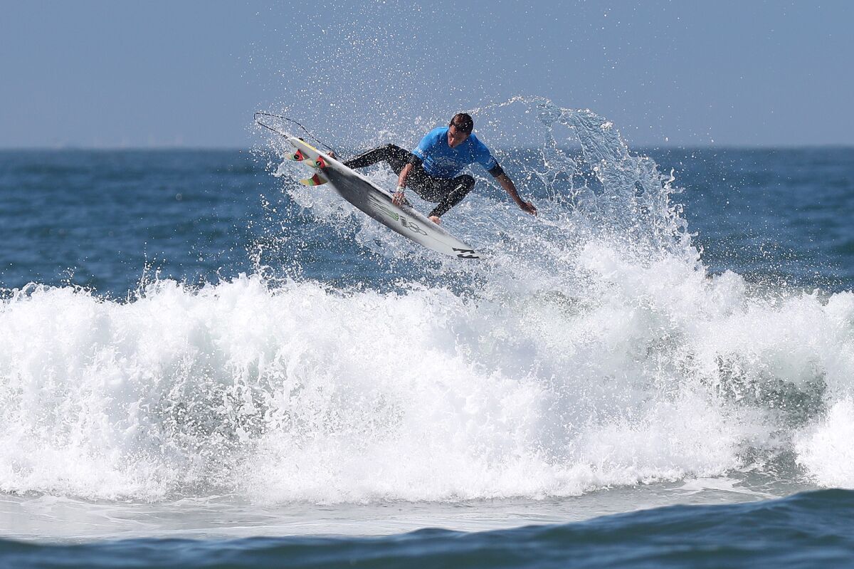 U.S. surfer Eithan Osborne competes in Heat 2 of the Challenger Series men's quarterfinals Saturday in Huntington Beach.