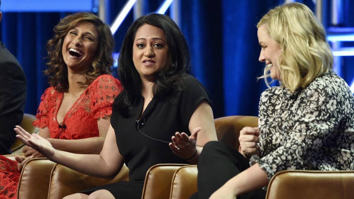 Aseem Batra, center, with Sarayu Blue, left, and Amy Poehler during the 2018 Television Critics Assn, Summer Press Tour on Wednesday